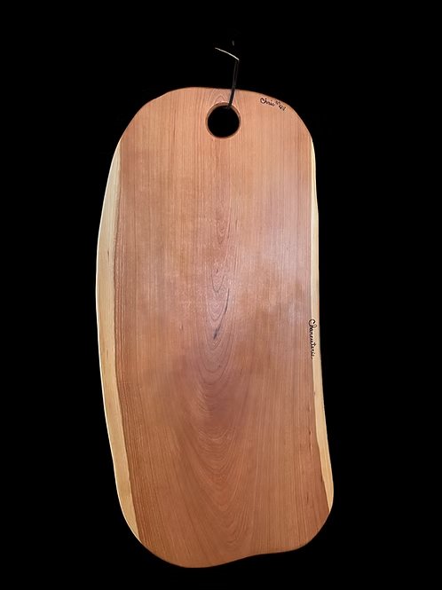 Wooden cheese board with a hanging hole